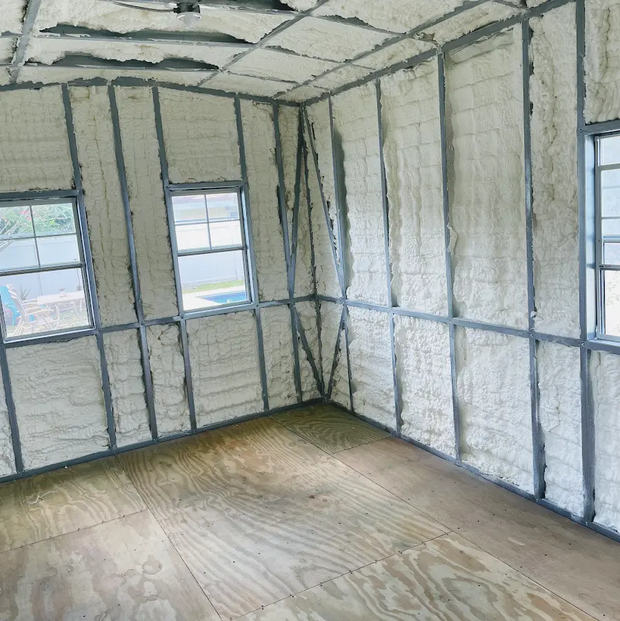 Closed-cell spray foam insulation applied to wall cavities in a residential project in Mount Horeb